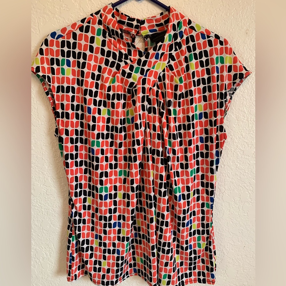 Woman’s Worthington blouse.